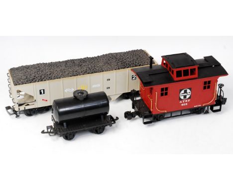 Bachmann G scale brown ATSF caboose No. 425, black HLW tanker, and a grey SNCF bogie high sided coal hopper wagon, with 4 app