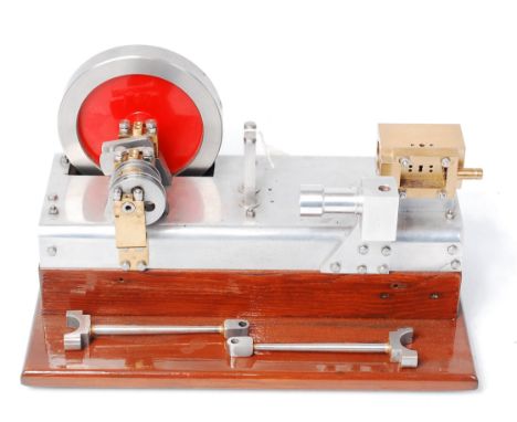 Partly built horizontal mill type engine on polished hardwood base, requiring cylinder (single) motion work, valve guides, pa