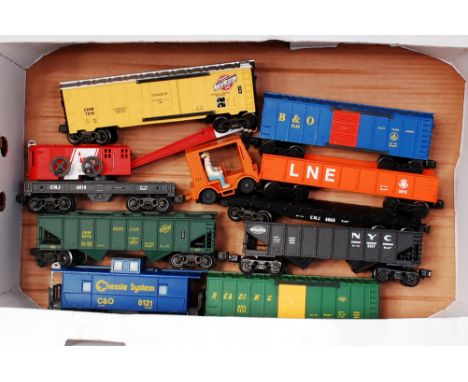 A large tray containing 9 bogie K Line items including North Western box car, B&O box  car, LNE open, CNJ flat, NYC  hopper, 
