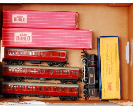 A Hornby Dublo 3-rail EDL17 BR black tank engine, box with inner packing (VG-BG), 2 maroon suburban composite coaches (one in