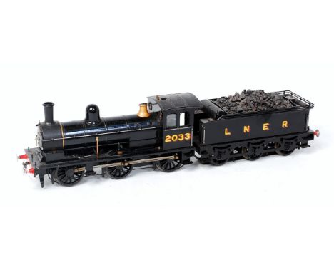 Ex North Eastern Railway 0-6-0 black goods engine and tender N. 2033 fitted with can motor and skate pickup on connected tend