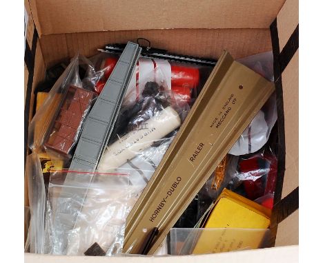 Small box containing wagon parts, transfers by Wrenn, Fox, etc, sundry oddments, all ex model maker's workshop (a/f)