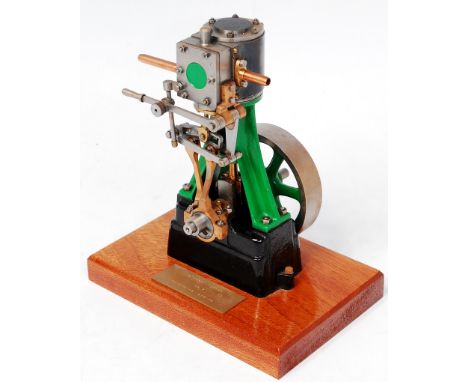 Stuart Turner, No.7 vertical steam engine comprising of single vertical cylinder suspended on a single A frame, with cast in 