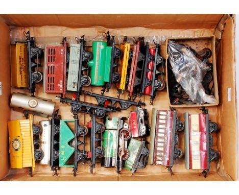 A large tray of assorted postwar Hornby wagons including Cement, National Benzole tanker, LMS hopper, No. 1 lumber, No. 1 tim