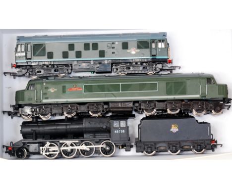 A Hornby BR black class 8F engine and tender (G) together with a BR green class diesel locomotive (G) and a Mainline lCo-Col 