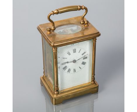 EARLY 20TH CENTURY FRENCH BRASS CARRIAGE CLOCK
with cylinder platform escapement and four column case and enamel dial, 14cm h