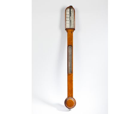 VICTORIAN OAK STICK BAROMETER
maker Bryson of Edinburgh, with arched ivory indicator dial and thermometer, turned reservoir c