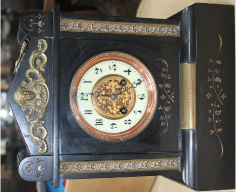 LATE NINETEENTH CENTURY BLACK SLATE FRENCH MANTEL CLOCK BY MARTI ET CIE
No. 2696, the circular enamel chapter ring with Arabi