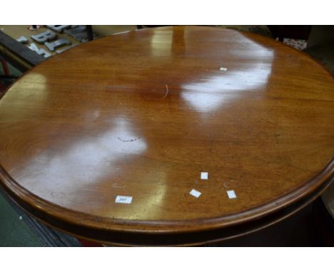 A Victorian mahogany tilt-top centre table, circular top, turned column and underfinial, cabriole legs, ceramic casters, circ