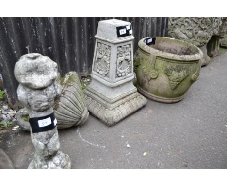 A reconstituted stone planter; a reconstituted stone column; a reconstituted stone statue; a small reconstituted stone plante