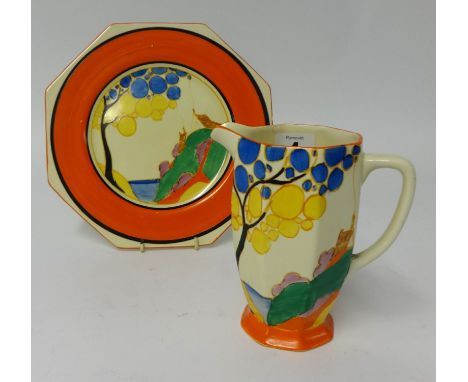 Clarice Cliff, a Fantasque jug, height 15cm (small chip to rim), together with a similar patterned octagonal plate (2).