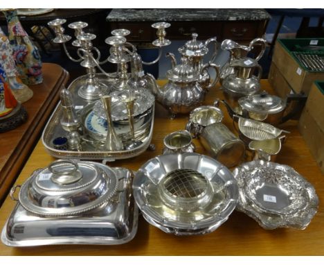 A quantity of silver plated wares including tea services, trays, candelabra, sugar castors, entre dishes etc.