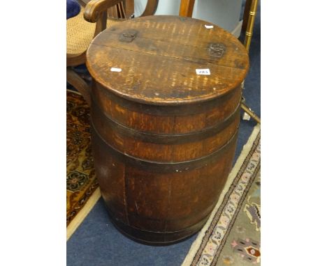 An antique oak and coopered barrel or stick stand with lid.