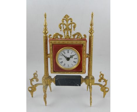 A red velvet mounted mantel clock, having pierced cornice with swan head finals to top, flanked by gilt metal piers, raised o