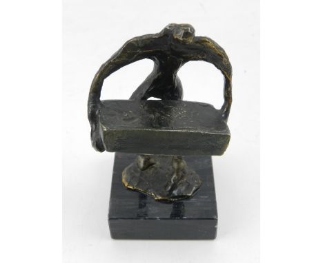 After Giocometti, a 20th century Continental bronze study ,' The Labourer', raised on a marble base. H. 13cm