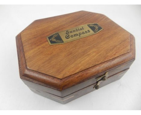 A sundial compass, in original box. 