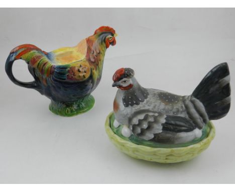 A rooster novelty teapot, polychrome decorated, together with a hen egg holder 