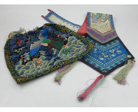 A Chinese silk embroidered bag, decorated with a peacock and fish amongst stylised waves and clouds, together with two pieces