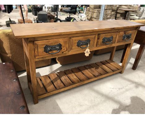 A SOLID HARDWOOD ORIENTAL STYLE SIDEBOARD WITH FOUR UPPER DRAWERS AND LOWER SHELF 