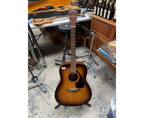 A YAMAHA 'F310' ACOUSTIC GUITAR AND CASE 