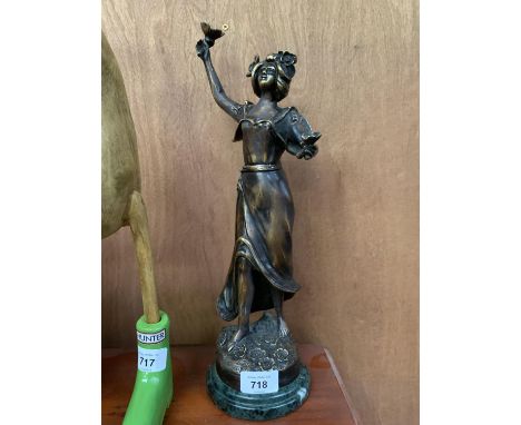 A BRONZE EFFECT FIGURE OF A LADY ON MARBLE STYLE BASE 