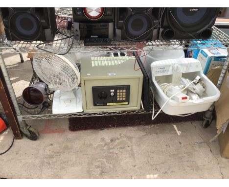 A MIXED LOT OF ELECTRICALS TO INCLUDE A FIBRE OPTIC LAMP, AN INFRA RED HEAT LAMP, FOOTSPA, SAFE (NO KEY), FAN, HAIRDRYER, TOA