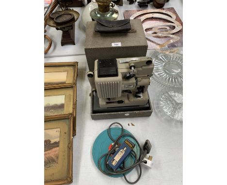 A SMALL VINTAGE 'EUMIG' PROJECTOR WITH LID 