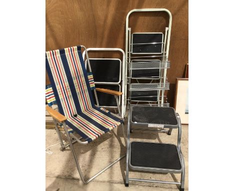 A METAL TWO STEP AND A THREE STEP LADDER A CHROME WALL RACK, A VINTAGE DECK CHAIR AND A STEP STOOL 