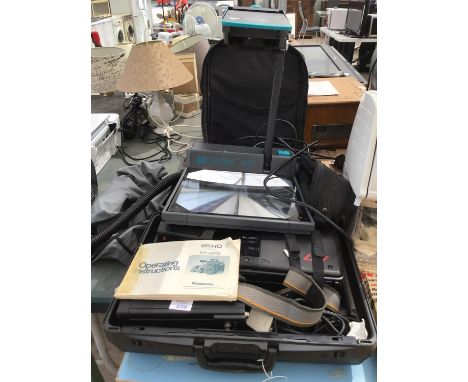 A PANASONIC VIDEO RECORDER NV-M7B AND A NOBO 509 OVERHEAD PORTABLE PROJECTOR WITH CARRY CASE 
