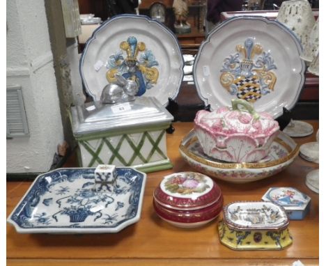 A pair of French faience armorial plates and similar decorative ceramics