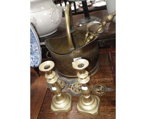 A brass coal scuttle, fire tools and similar items
