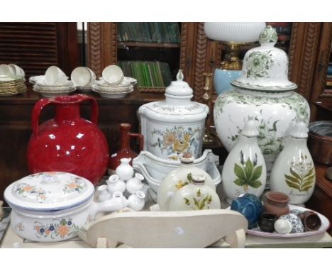 A French ceramic wall-hung container with reservoir, a large glazed pot and cover and a collection of decorative ceramics