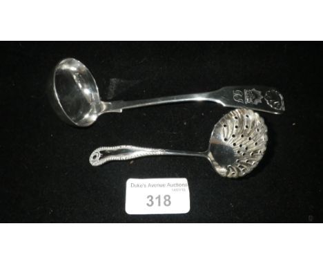 A Victorian Scottish silver sauce ladle, 'Fiddle and Shell' pattern and a shell bowl white metal sifter spoon (2)