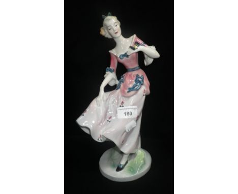 A Goldscheider figure of a lady with butterfly on her hand