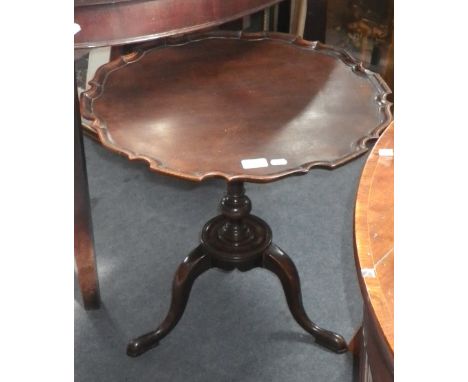 A mahogany tripod table with pie-crust top