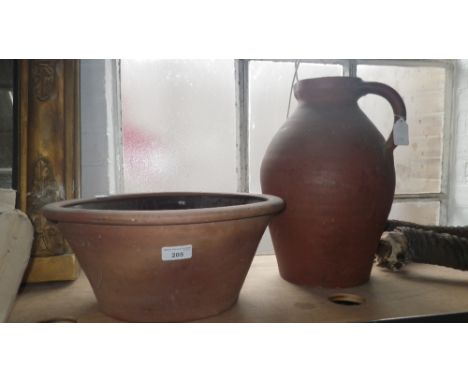 A large pottery ewer and a similar basin