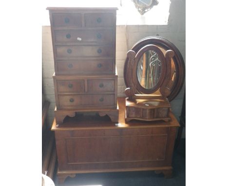 A small yew chest of drawers, a similar trunk and a collection of mirrors (as lotted)