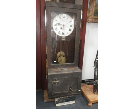 A Vintage Gledhill-Brook time recorder/clocking-in clock in an oak case