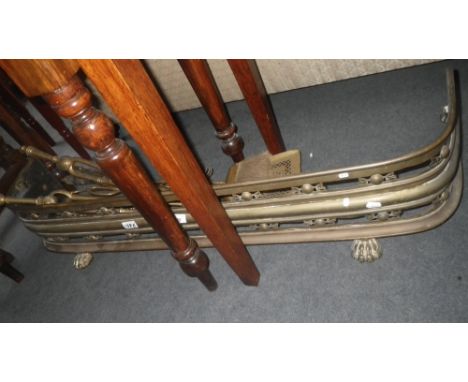 A Regency brass fender and a collection of fire tools