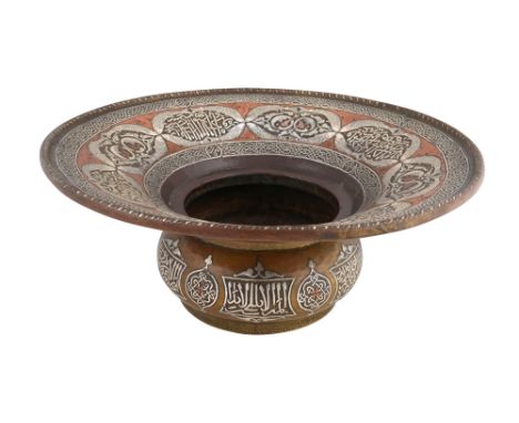 A DAMASCUS-WARE SILVER AND COPPER-INLAID COPPER BASIN WITH PAIRS OF FISH AND CALLIGRAPHY Damascus, Ottoman Syria, early 20th 
