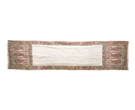 AN EMBROIDERED WHITE MUSLIN SHAWL Delhi, India, early 20th centuryOf long rectangular form, the finely woven white muslin gro