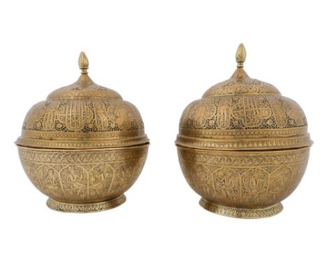 A PAIR OF OPENWORK ZAND-STYLE QAJAR BRASS LIDDED INCENSE BURNERS Qajar Iran, late 19th centuryEach of globular shape, with ge