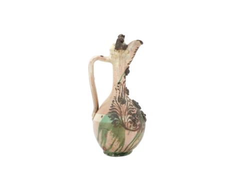 A LARGE GOLD-ENAMELLED AND GREEN-SPLASHED WHITE-GLAZED CANAKKALE POTTERY EWER Çanakkale, Ottoman Turkey, 19th centuryOf pyrif