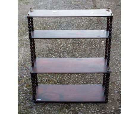 A Georgian mahogany graduating wall shelves, twist supports, brass ring handles&nbsp;