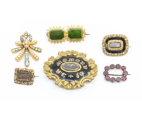 A Georgian garnet brooch, Georgian gold mourning brooch, nephrite jade and gold brooch, pearl brooch and others (6)