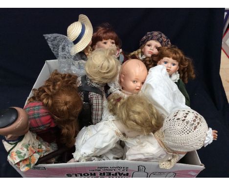 A collection of late 20th Century bisque headed dolls (Q)