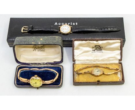 A collection of three ladies 9ct gold watches to include an early 20th century 9ct rose gold watch with round enamel dial Ara