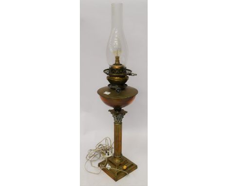 A Victorian style brass Corinthian column oil lamp converted to electricity