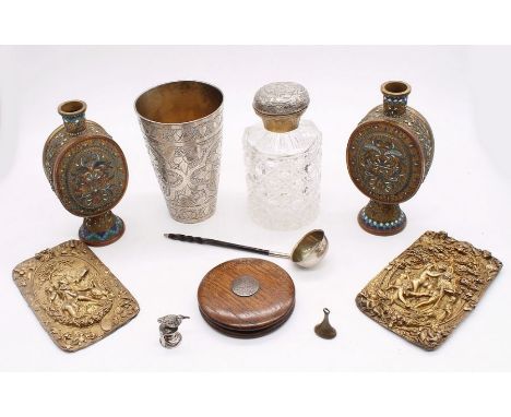 A Continental gilt metal topped cut glass perfume bottle and stopper, with an Eastern white metal engraved beaker, a whalebon