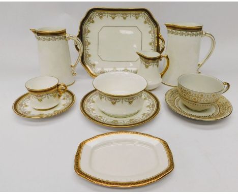 A collection of white ground and gilt, early 20th century china tea set items i.e. Cauldon, Ashworth, Ironstone and Bisto pot